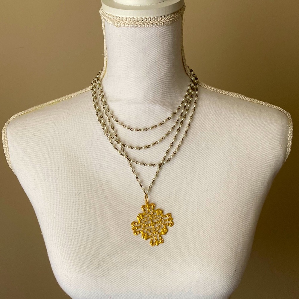 Pearl and gold medallion statement necklace
